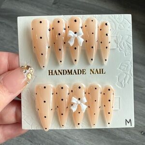 Peach Polka Dot Stiletto Press-On Nails with White Bows